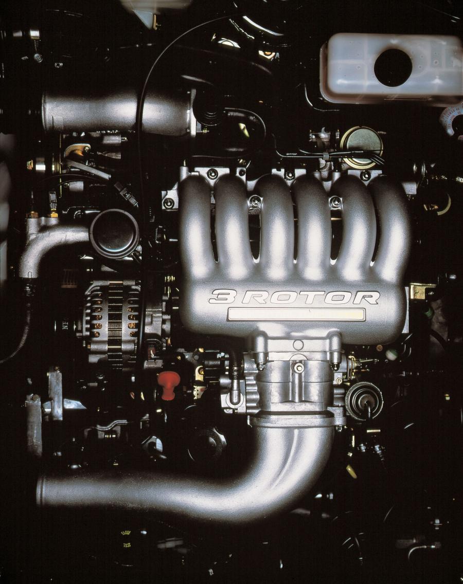 Моторный отсек Eunos Cosmo 1990 года  (фото 29 из 29)